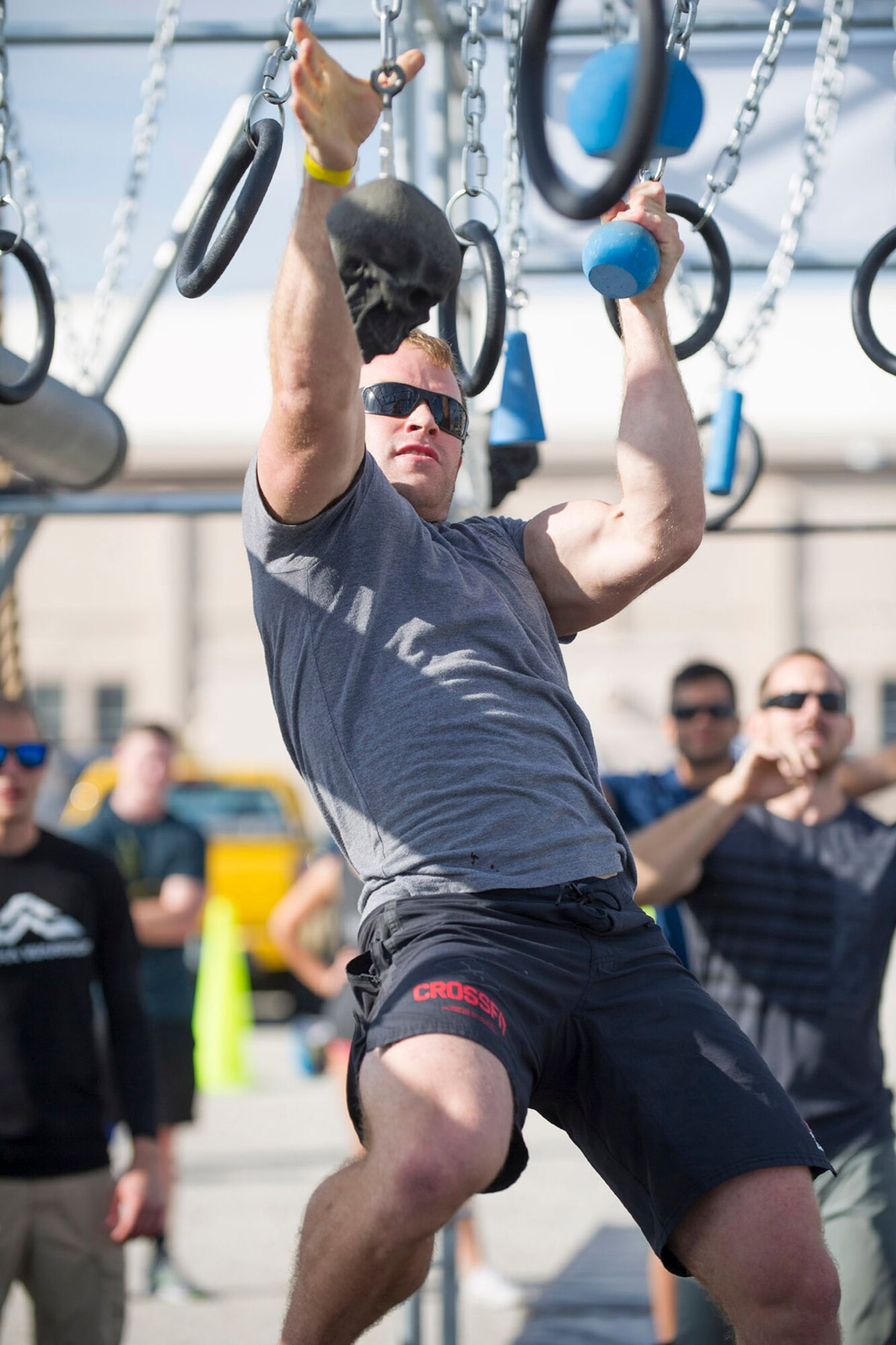 Staff Sgt. Michael McCune, 308th Rescue Squadron survival, evasion, resistance and escape specialist, makes his way through the radial wings portion of the Alpha Warrior Course April 22, 2017 set up at Patrick Air Force Base, Florida. The course, which included obstacles from the hit show American Ninja Warrior, enticed 37 Airmen and civilians from the base to compete. (U.S. Air Force photo/Phillip Sunkel)