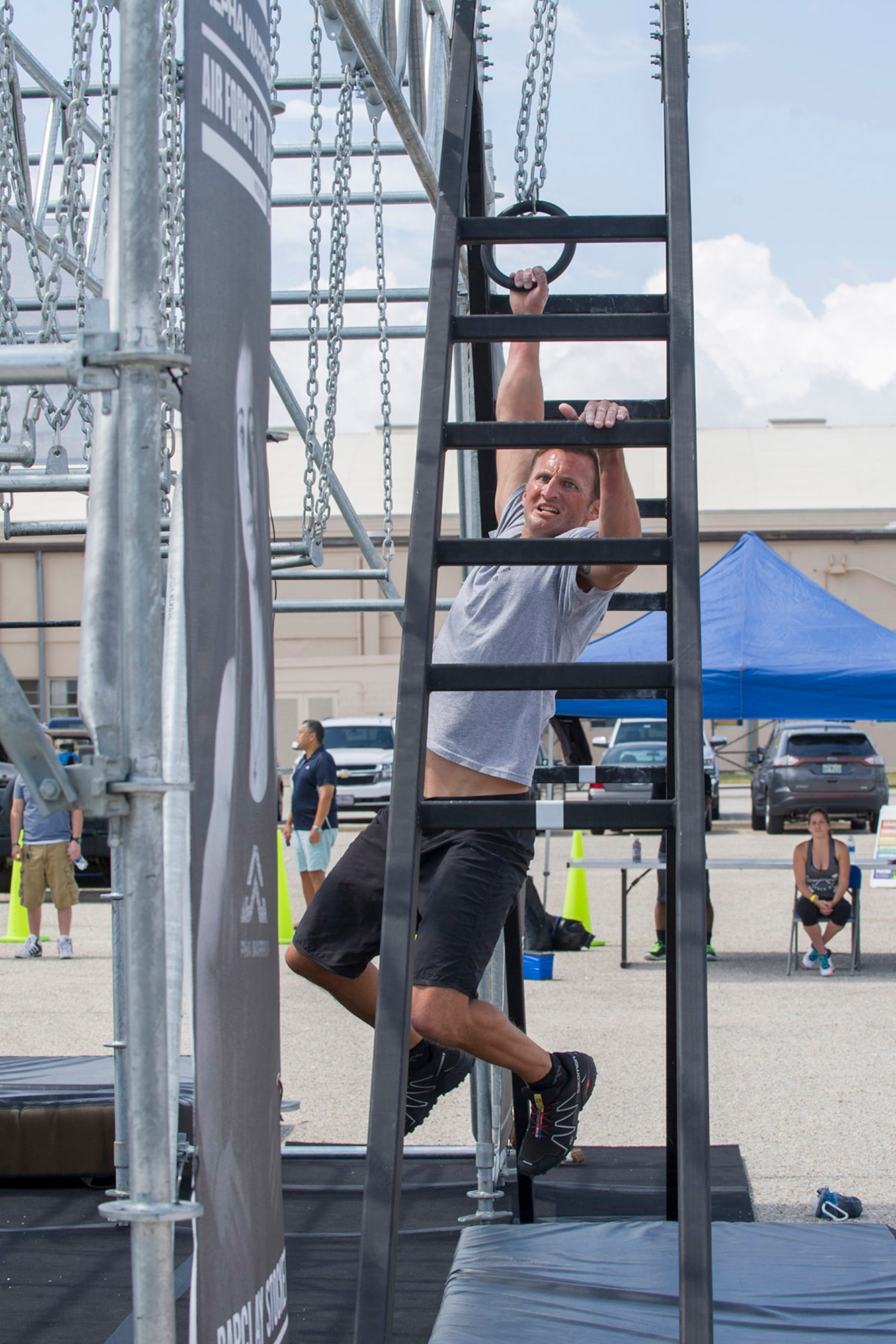 Tech. Sgt. Kyle Minshew, 308th Rescue Squadron pararescueman, puts his upper body strength to the test as he works his way through the Alpha Warrior Course April 22, 2017 set up at Patrick Air Force Base, Florida. Minshew placed second in the competition out of 37 competitors. (U.S. Air Force photo/Phillip Sunkel)