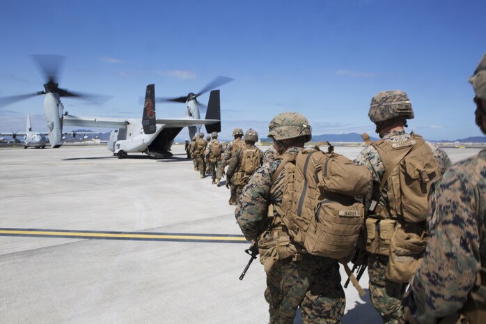 U.S. Marines with Headquarters and Support Company, 3rd Battalion, 8th Marine Regiment, 2nd Marine Division, load a U.S. Marine Corps MV-22B Osprey  during the 41st Japan Maritime Self-Defense Force – Marine Corps Air Station Iwakuni Friendship Day at MCAS Iwakuni, Japan, May 5, 2017. Since 1973, MCAS Iwakuni has held a single-day air show designed to foster positive relationships and offer an elevating experience that displays the communal support between the U.S. and Japan. The air show also encompassed various U.S. and Japanese static aircraft displays, aerial performances and demonstrations, food and entertainment. (U.S. Marine Corps photo by Lance Cpl. Jacob Farbo)