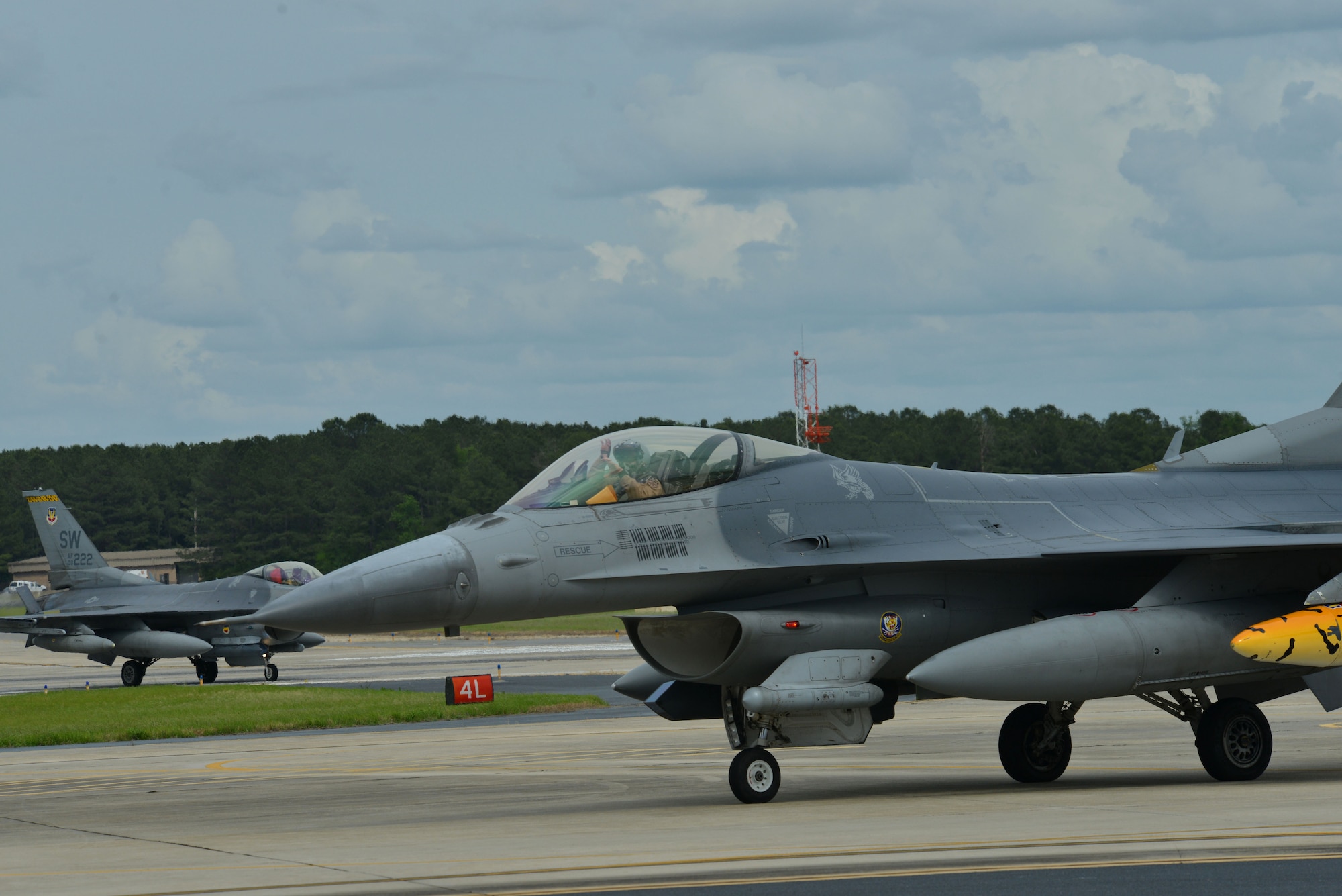 An F-16CM Fighting Falcon pilot assigned to the 79th Fighter Squadron returns home to Shaw Air Force Base, S.C., May 4, 2017, after a six-month deployment to Bagram Airfield, Afghanistan. While deployed, the pilot supported Operation Freedom’s Sentinel, which focuses on assisting Afghanistan’s people and government. (U.S. Air Force photo by Airman 1st Class Destinee Sweeney)