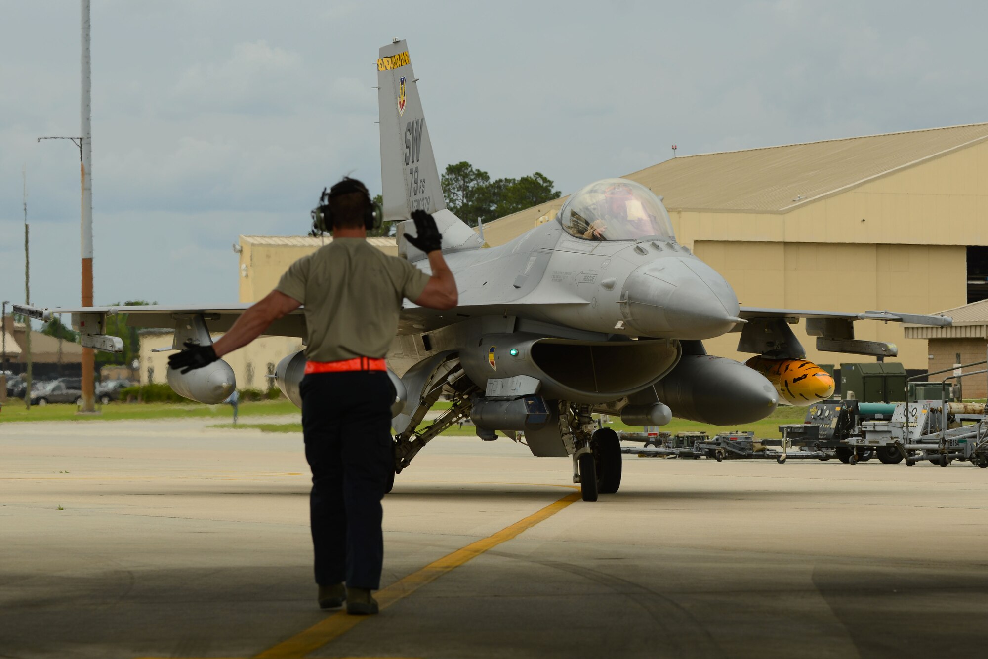 An F-16CM Fighting Falcon pilot assigned to the 79th Fighter Squadron returns home to Shaw Air Force Base, S.C., May 4, 2017, after a six-month deployment to Bagram Airfield, Afghanistan. The F-16CM Fighting Falcon is a compact, multi-role fighter aircraft capable of air-to-air combat and air-to-surface attack. (U.S. Air Force photo by Airman 1st Class Kathryn R.C. Reaves)