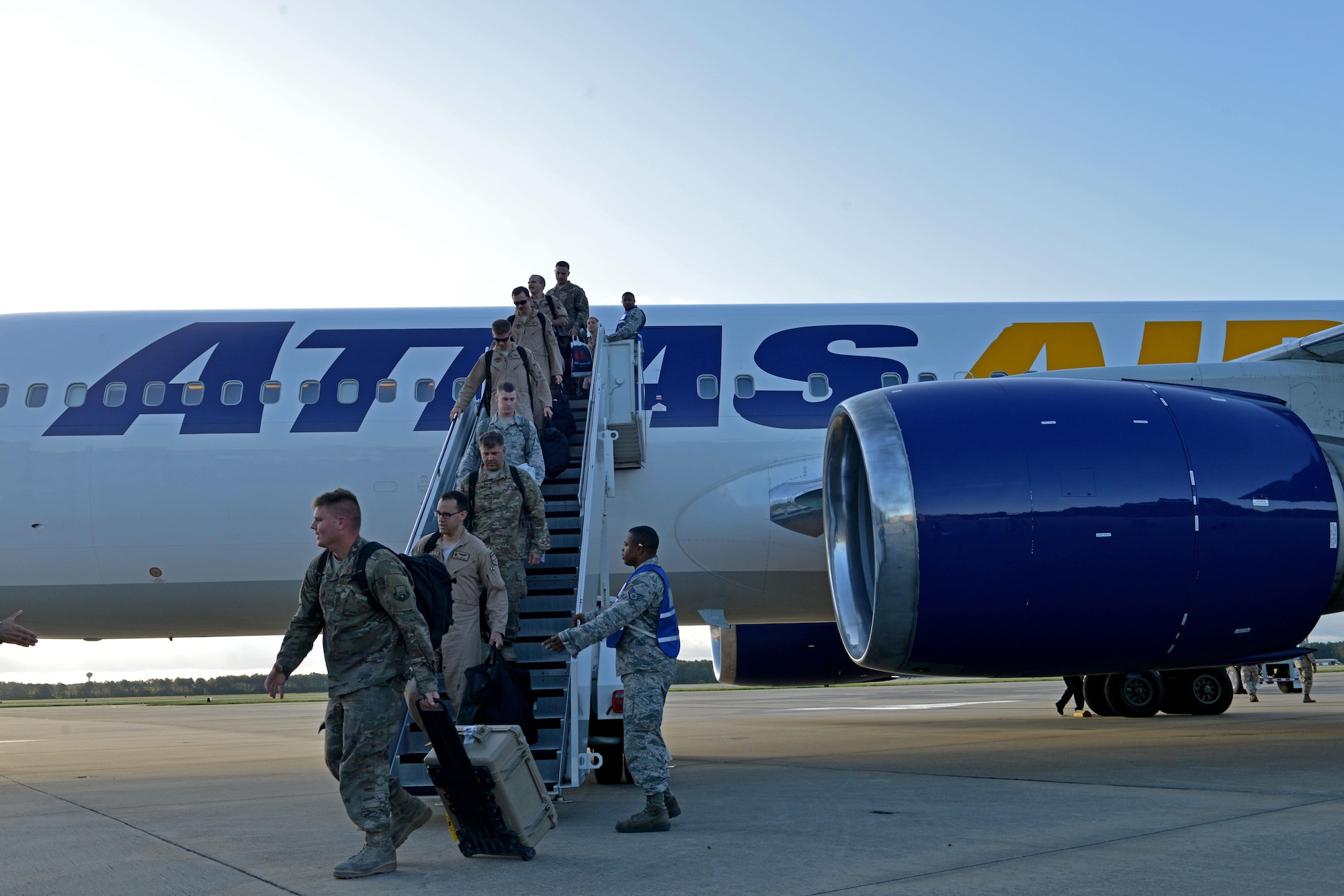 U.S. Airmen assigned to the 79th Fighter Squadron (FS) and the 20th Aircraft Maintenance Squadron, 79th Aircraft Maintenance Unit step off an aircraft onto the flightline of Shaw Air Force Base, S.C., May 5, 2017 after a six-month deployment to Bagram Airfield, Afghanistan. The 79th FS is one of three 20th Fighter Wing F-16CM Fighting Falcon squadrons which supply suppression of enemy air defenses and combat-ready airpower. (U.S. Air Force Airman 1st Class Destinee Sweeney)