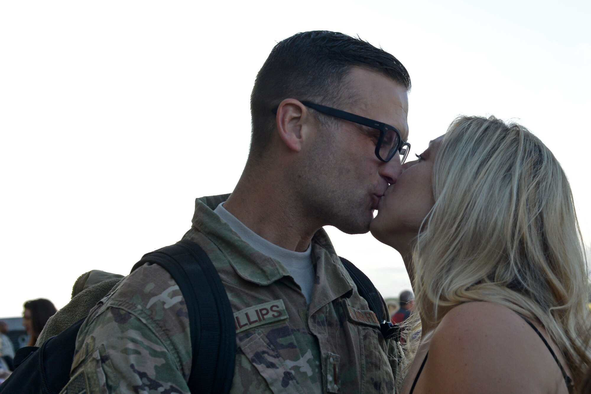 A U.S. Airman assigned to the 20th Fighter Wing kisses his significant other after returning to Shaw Air Force Base, S.C., May 5, 2017. Airmen returned after a six-month deployment to the United States Central Command area of responsibility. (U.S. Air Force photo by Airman 1st Class Destinee Sweeney)