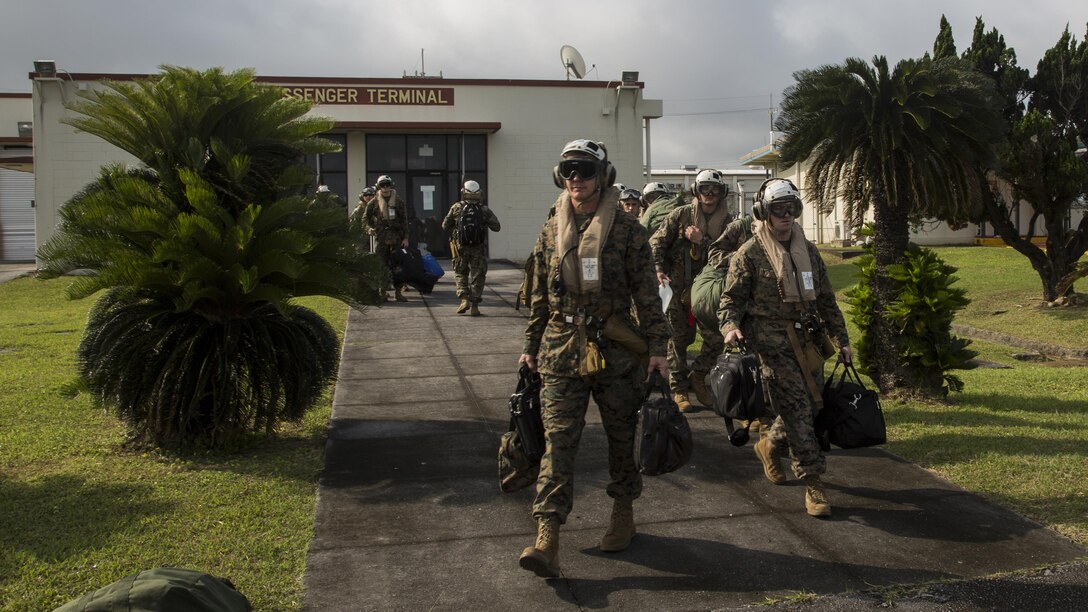 Marines with III Marine Expeditionary Force, Alert Contingency Marine Air Ground Task Force prepare to board a MV-22 osprey during a ACM drill, on Marine Corps Air Station Futenma, Okinawa, Japan, May 5, 2017. The ACM must be prepared to respond within 24 hours to crises throughout the Asian pacific region to mitigate crises, protect U.S. citizens, and territories, or counter threats to U.S. national interests as needed. 