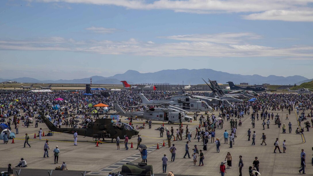 Japanese locals view various U.S. and Japanese static display aircraft during the 41st Japan Maritime Self-Defense Force – Marine Corps Air Station Iwakuni Friendship Day at MCAS Iwakuni, Japan, May 5, 2017. Displays included of F/A-18C and F/A-18D Hornets, an MV-22B Osprey and F-35B Lightning II from the III Marine Expeditionary Force, F-16 Fighting Falcon, A-10 Thunderbolt II, and KC-135 Stratotanker from U.S. forces in Korea. Displays also encompassed a C-1, MC-130J, A6M Zero, and MCH-101 from the Japan Air Self-Defense Force and JMSDF, along with WACO biplanes and Cessna airplanes from the Aircraft Owners and Pilots Association Japan.