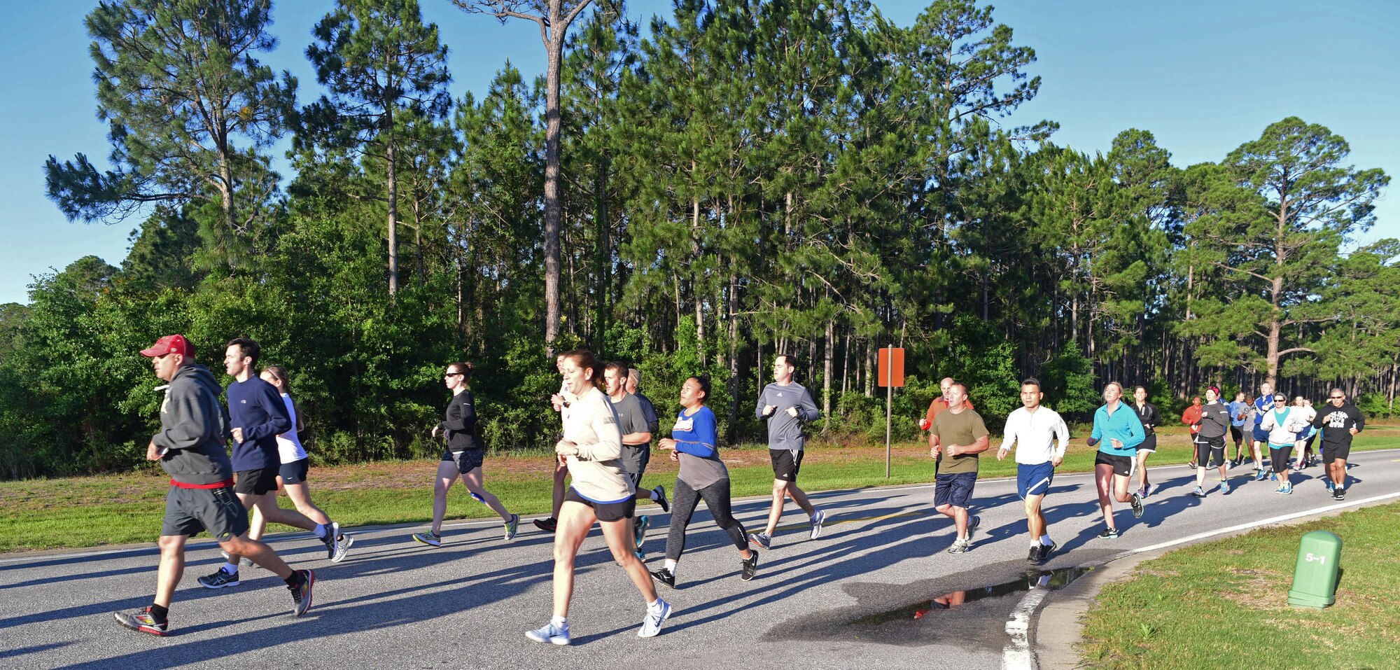 Air Commandos begin a 5K run at Hurlburt Field, Fla., May 5, 2017. Both Airmen and civilians at Headquarters Air Force Special Operations Command ran together during a physical training session. (U.S. Air Force photo/Staff Sgt. Melanie Holochwost)