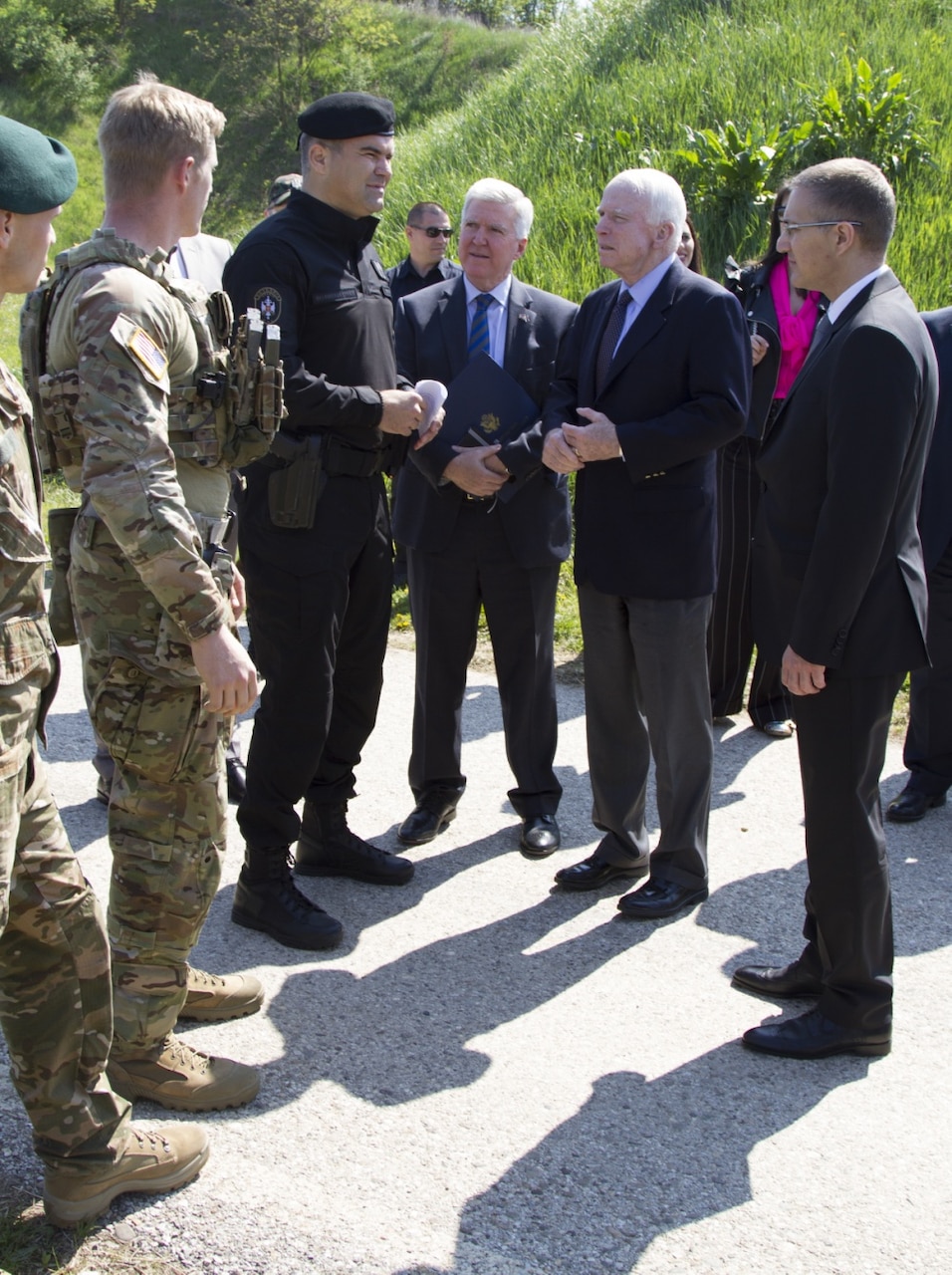 U.S. special operations forces greet U.S. Sen. John McCain, U.S. Ambassador Kyle Randolph Scott, Serbian Minister of Internal Affairs, Nebojsa Stefanovic and Serbian special anti-terrorist unit commander, Spasoje Vulevic, during a joint combined exchange training exercise at the unit’s headquarters complex in Serbia, April 10, 2017. The unit serves as a special operations and tactical unit of the Serbian police and received training from April 3-30 in a variety of tactics and techniques over the course of the JCET to increase their effectiveness in future operations. Army photo by Sgt. Nelson Robles