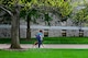 Stephanie Shipwash, a graduate assistant at the University of Central Missouri, maneuvers around the campus with her service dog, Gabbie, in Warrensburg, Mo., April 20, 2017. Gabbie came from a local non-profit organization, called Warriors’ Best Friend, which trains rescue dogs exclusively to help veterans who separated from the military with post-traumatic stress disorder or traumatic brain injury. (U.S. Air Force photo by Airman 1st Class Jazmin Smith)