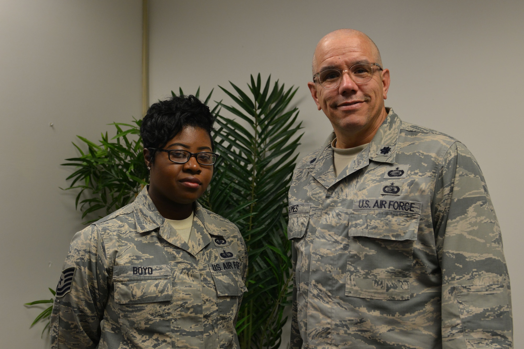 U.S. Air Force Staff Sgt. Jessyca Boyd, 20th Fighter Wing (FW) Equal Opportunity (EO) noncommissioned officer in charge, left, and Lt. Col. Donald M. Gomes, 20th FW EO director, stand for a picture at Shaw Air Force Base, S.C., May 3, 2017. The two Airmen are responsible for human relations education, mediation and helping to monitor unit climate via surveys. (U.S. Air Force photo by Airman 1st Class Destinee Sweeney)