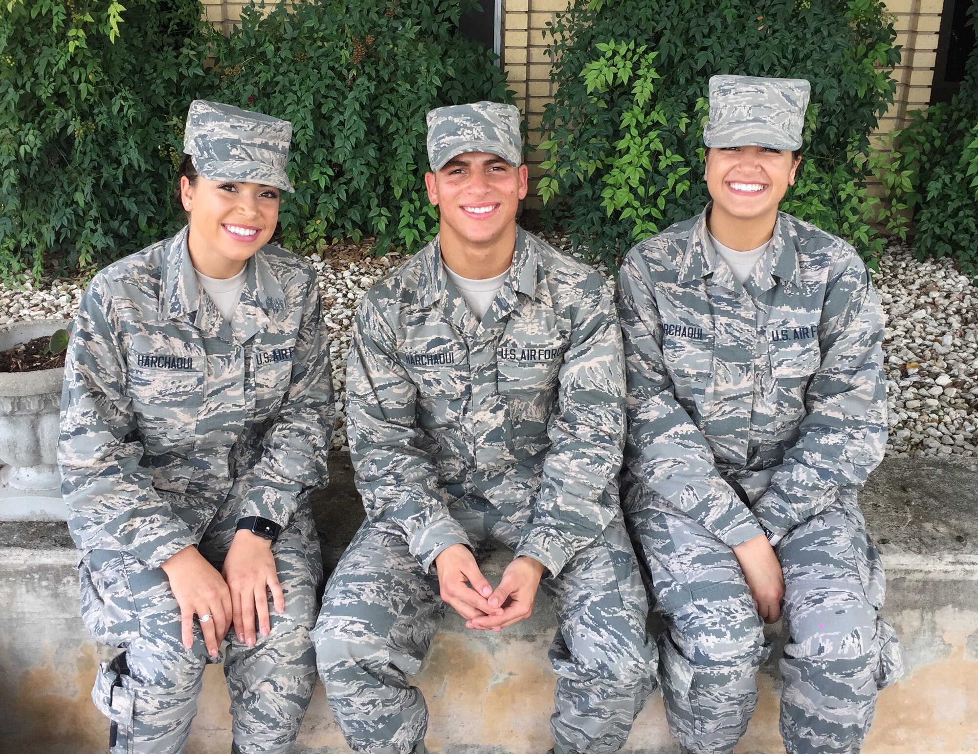 Pictured are the Harchaoui triplets (from left): Myriam, 436th Supply Chain Operations Squadron at Scott Air Force Base, Ill.; Rabah, 56th Security Forces Squadron at Luke AFB, Ariz.; and Warda, 60th Medical Operations Squadron at Travis AFB, Calif. All three were born in Algeria before immigrating to the United States, and are Airmen serving in today’s Air Force. (Courtesy photo)
