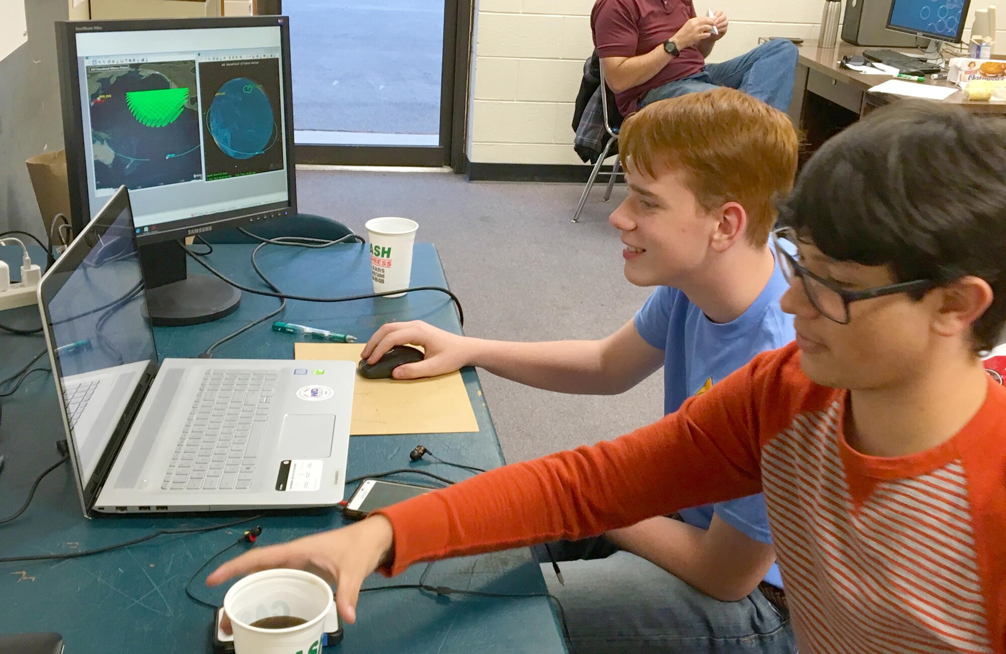 Oren Harper and Garrett Farrar prepare for the Air Force Association StellarXplorers space system design competition in November 2016. Both students at Coffee County Central High School are members of the Air Force Junior ROTC. They recently competed in March as the Coffee County High School Team One and placed second in the competition for the East Region. The High School had two teams who competed in the Prestige Division. As part of the competition, teams must present solutions to a typical space design problem, such as orbit determination, satellite component selection and launch vehicle planning, as outlined in a scenario describing the system’s mission and constraints. The AEDC Science, Technology, Engineering and Mathematics Center coordinator, Jere Matty, and the Women in Defense membership director, Kim Nelson, provided support that enabled the team to compete. (Courtesy photo)