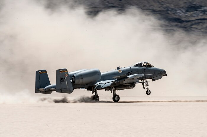 An A-10 Thunderbolt II fighter jet assigned to the 66th Weapons Squadron, U.S. Air Force Weapons School, Nellis Air Force Base, Nev., lands on a dry lake bed during a composite mission application exercise at the Nevada Test and Training Range, April 24, 2017. Training on improvised and degraded landing zones increases force readiness and prepares aircrews for real-world operations in contested areas. (U.S. Air Force photo by Senior Airman Joshua Kleinholz/Released)