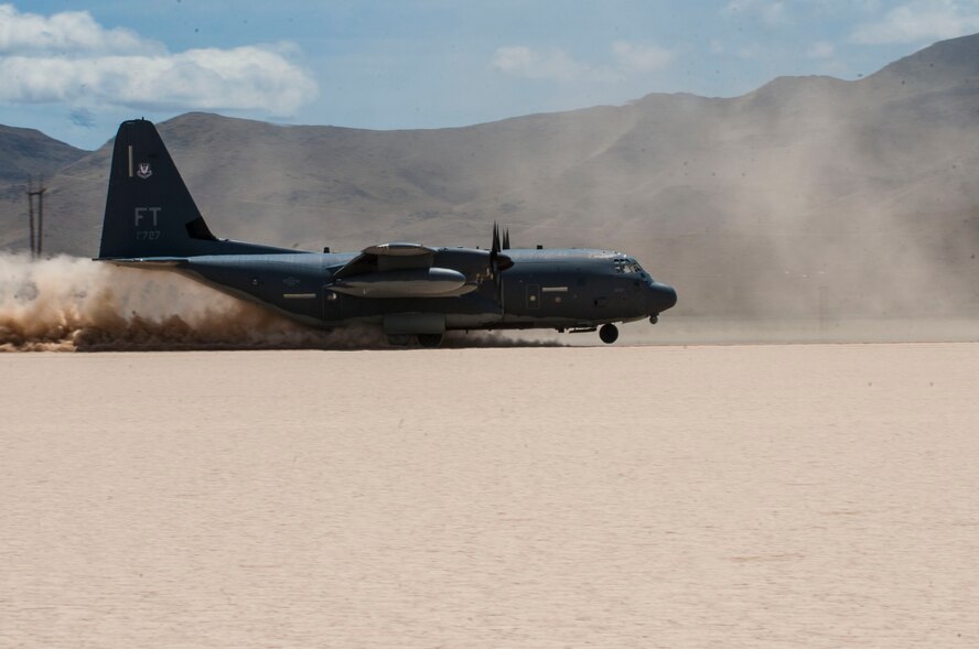 An HC-130P/N King cargo aircraft assigned to the 34th Weapons Squadron, U.S. Air Force Weapons School, Nellis Air Force Base, Nev., lands on a dry lake bed during a composite mission application exercise at the Nevada Test and Training Range, April 24, 2017. The HC-130P/N is an extended-range version of the C-130 Hercules transport. HC-130 crews provide expeditionary, all-weather personnel recovery capabilities to combatant commanders and joint/coalitions partners worldwide. (U.S. Air Force photo by Senior Airman Joshua Kleinholz/Released)