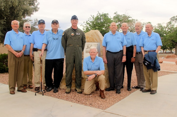 Members of the F-86 Sabre Association pose for a photo with Col. Michael Drowley, U.S. Air Force Weapons School commandant on Nellis Air Force Base, Nev., April 7, 2017. The F-86 Sabre Association met April 24 on the flightline here to pay homage to the retired jet and the Airmen who flew it for the last time. (U.S. Air Force photo by Susan Garcia/Released) 