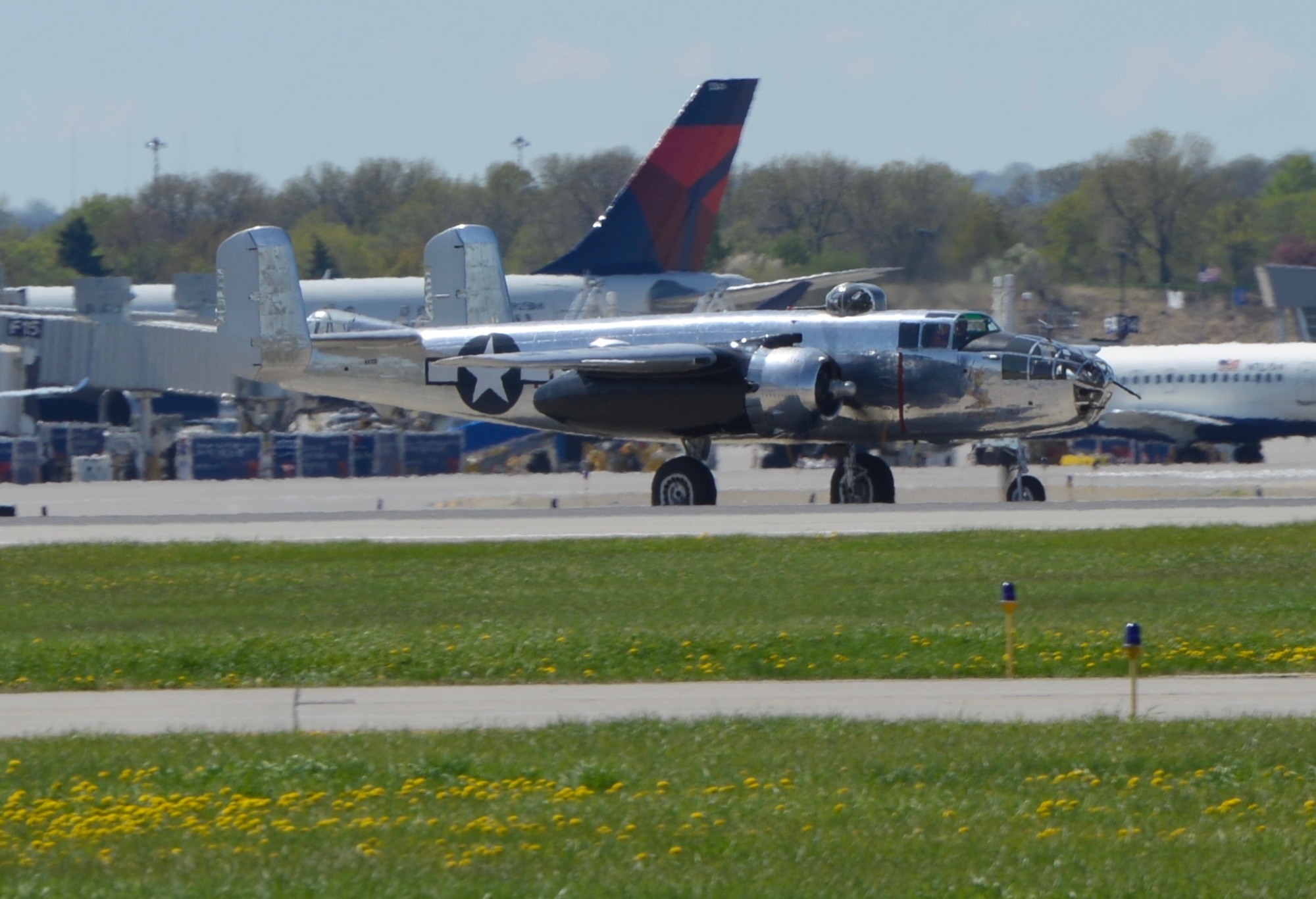A World War II era B-25 "Mitchell" bomber was flown to the 934th Airlift Wing May 4 and will be on display at the May wing commander's call. The presence of the bomber pays homage to the Air Force 70th anniversary this year. The plane is the type flown during the Dolittle raid in WW II. The planes were specially modified in Minneapolis prior to the raid to give them the range necessary to reach Japan. The aircraft is owned and flown by a local Twin Cities flying group. (Air Force photos/Paul Zadach)

