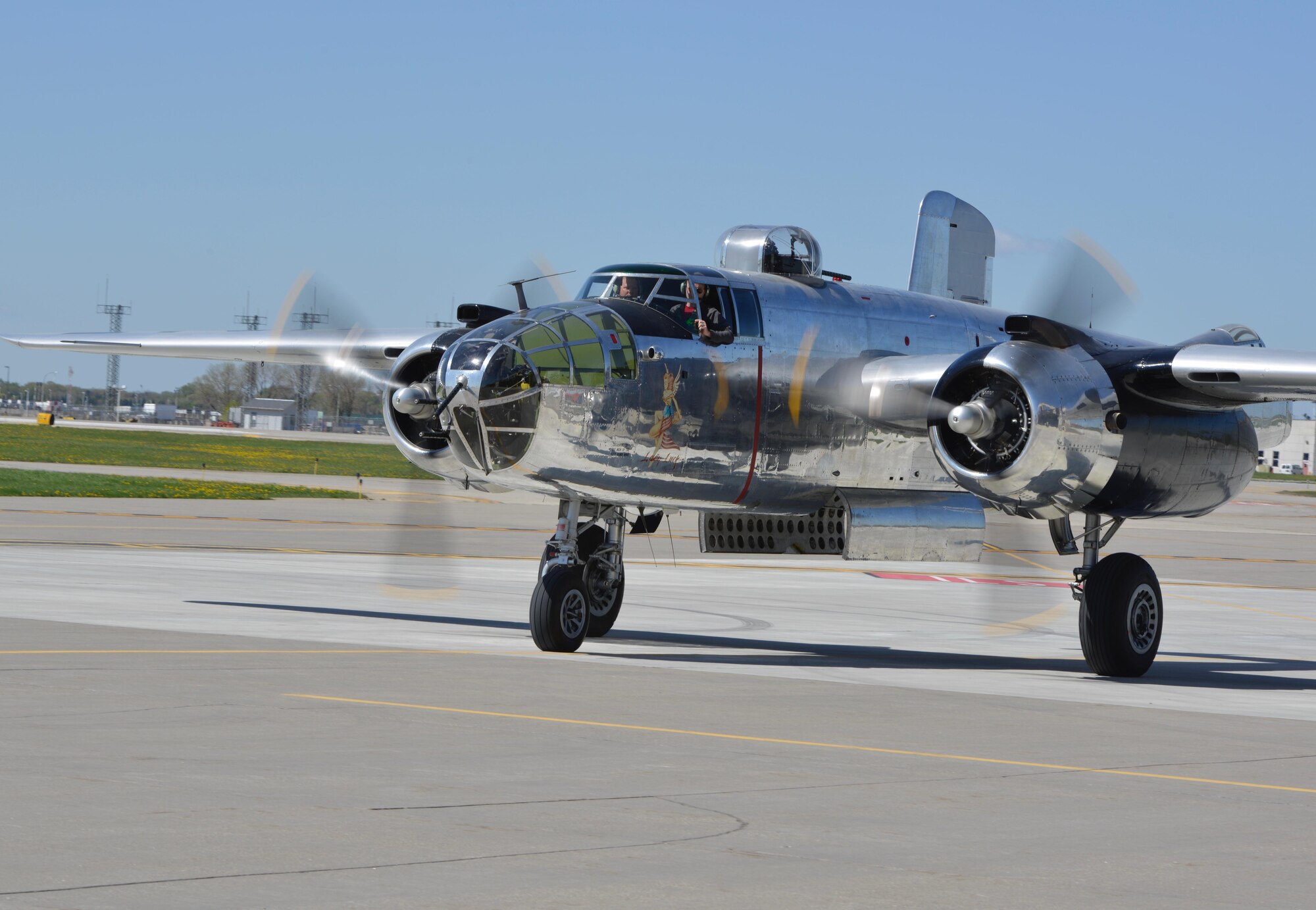 A World War II era B-25 "Mitchell" bomber was flown to the 934th Airlift Wing May 4 and will be on display at the May wing commander's call. The presence of the bomber pays homage to the Air Force 70th anniversary this year. The plane is the type flown during the Dolittle raid in WW II. The planes were specially modified in Minneapolis prior to the raid to give them the range necessary to reach Japan. The aircraft is owned and flown by a local Twin Cities flying group. (Air Force photos/Paul Zadach)

