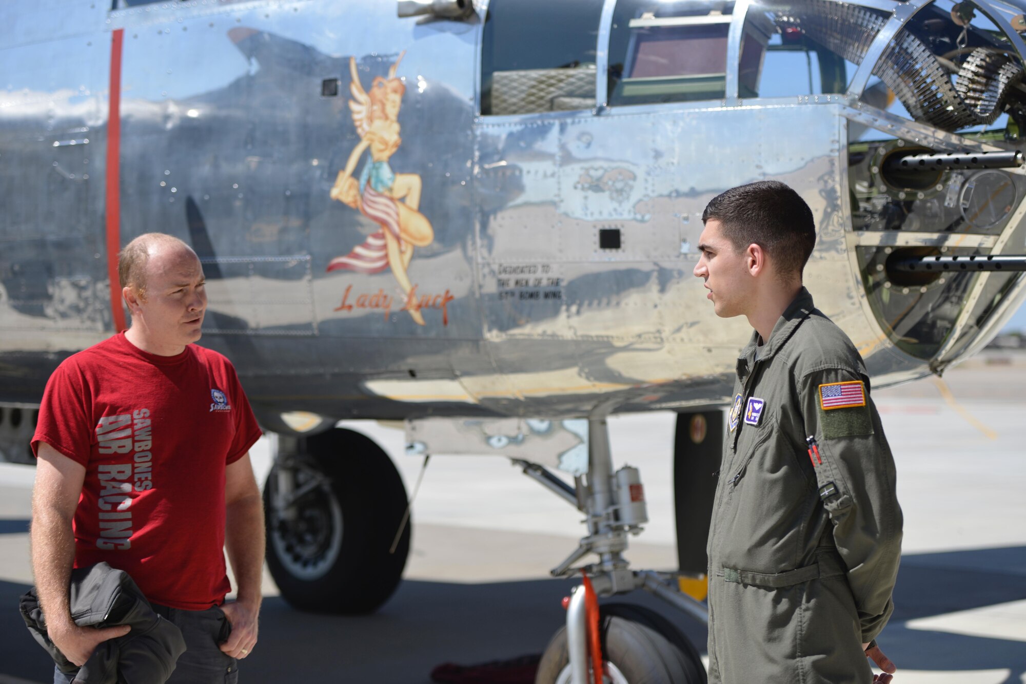 Staff Sgt. Brandon Eley talks with B-25 pilot Patrick Harker May 4 after the historic bomber's arrival at the 934th.