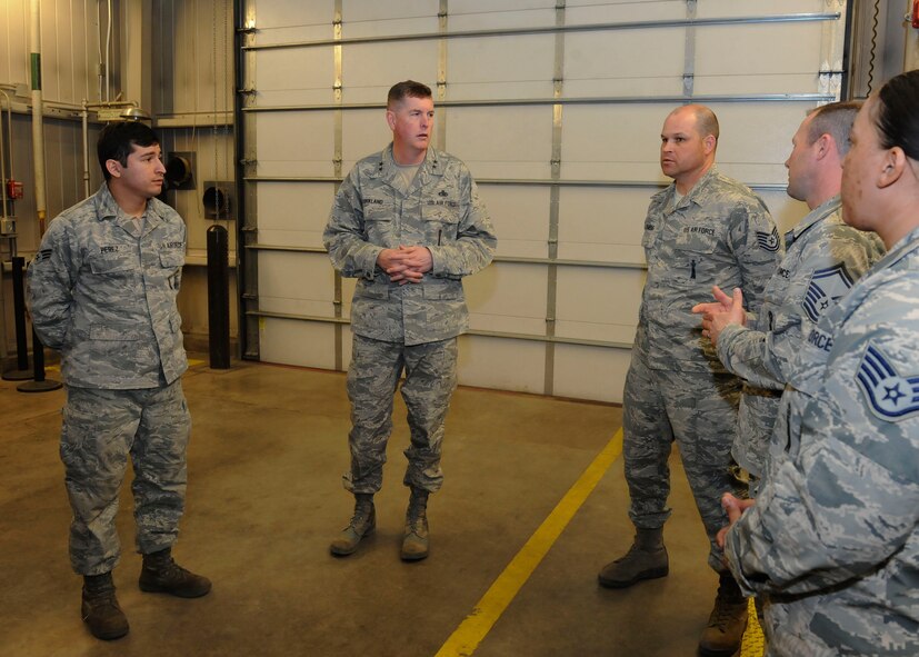 Maj. Gen. Gene Kirkland, Air Force Material Command director of logistics, civil engineering and force protection, talks with Airmen at Minot Air Force Base, N.D., Apr. 28, 2017. Kirkland visited to discuss logistics 5th Bomb Wing and 91st Missile Wing Airmen and speak at the 91st Maintenance Group Maintenance Professional of the Year banquet. (U.S. Air Force photo/Airman 1st Class Jessica Weissman)