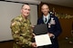 Montana National Guard Adjutant General Maj. Gen. Matthew Quinn presents the Montana National Guard Distinguished Service Medal to Col. Patrick Hover during his retirement ceremony held at the 120th Airlift Wing in Great Falls, Mont. April 28, 2017. Hover last served as the commander of the 120th Operations Group. (U.S. Air National Guard photo by Senior Master Sgt. Eric Peterson)