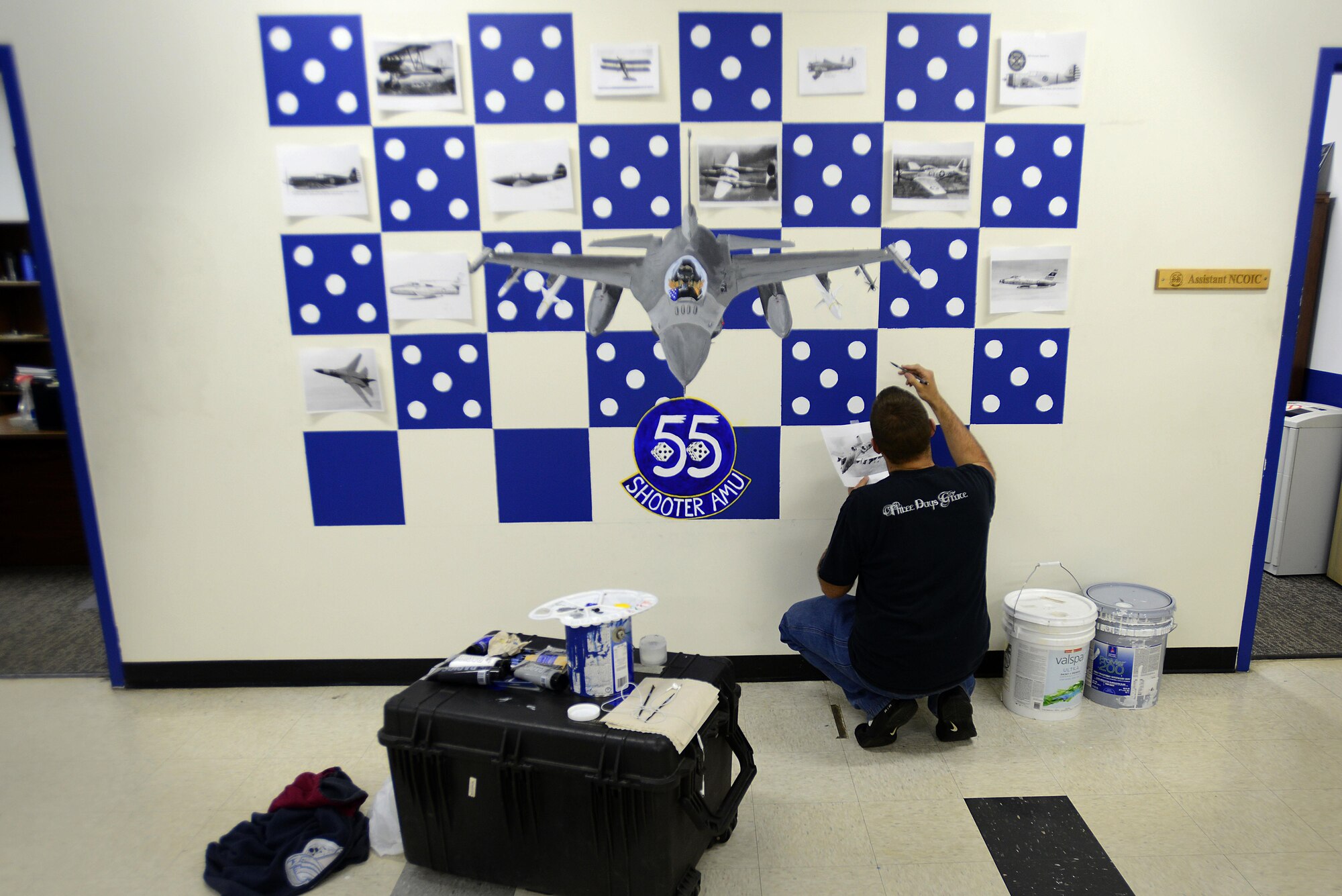 U.S. Air Force Tech. Sgt. Brian Barnes, 20 Aircraft Maintenance Squadron, 55th Aircraft Maintenance Unit (AMU) tactical aircraft maintainer, sketches an A-10 Thunderbolt II on a mural in the 55th AMU at Shaw Air Force Base, S.C., Feb. 10, 2017. The mural was designed for the 55th Fighter Squadron’s 100th anniversary to showcase all of the aircraft previously, and currently, flown by them. (U.S. Air Force photo by Airman 1st Class Kelsey Tucker)