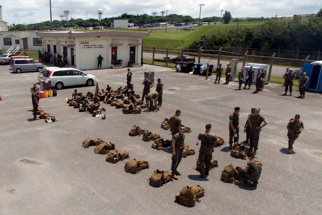 Marines stand by during an Alert Contingency Marine Air-Ground Task Force drill at Kadena Air Base in Okinawa, Japan, May 5, 2017. Marine Corps photo by Sgt. Scott P. Smolinksi