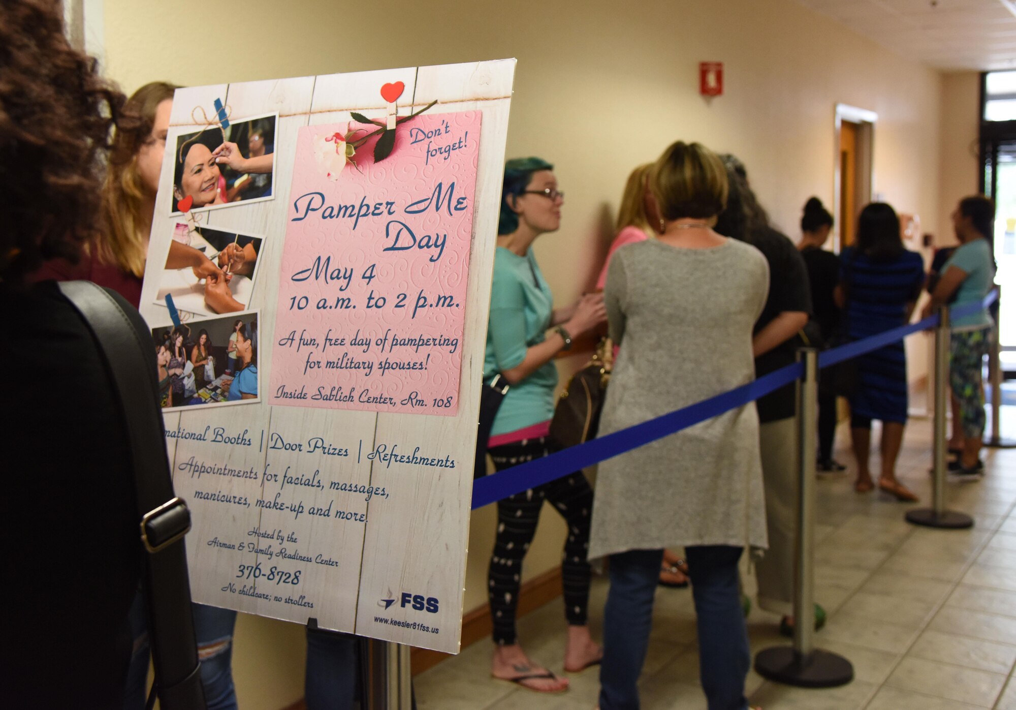 Keesler spouses line the wall during Pamper Me Day at the Sablich Center May 4, 2017, on Keesler Air Force Base, Miss. Keesler’s Airman and Family Readiness Center has hosted the event for the past 13 years, offering spouses free manicures, make-up styling tips and information and business booths. (U.S. Air Force photo by Kemberly Groue)