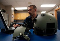 Brian Amitrano, 54th Helicopter Squadron aircrew flight equipment member, searches equipment data at Minot Air Force Base, N.D., May 2, 2017. The unit’s maintainers fix and inspect flying and training equipment for aircrew, to include helmets and night vision goggles. (U.S. Air Force photo/Airman 1st Class Jonathan McElderry)