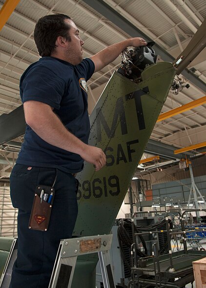 Thomas Martinez, 54th Helicopter Squadron aircraft mechanic, prepares to drain oil from a gear box at Minot Air Force Base, N.D., May 2, 2017. Squadron members also engage in emergency search and rescue mission training. (U.S. Air Force photo/Airman 1st Class Jonathan McElderry)