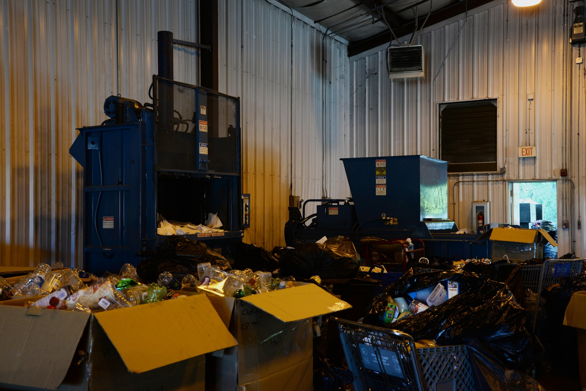 Multiple machines crush, shred and pack recyclables at the recycling center May 2, 2017, at Columbus Air Force Base, Mississippi. The money saved from recycling bought the center new equipment designed to help ease the process of recycling. (U.S. Air Force photo by Airman 1st Class Beaux Hebert)