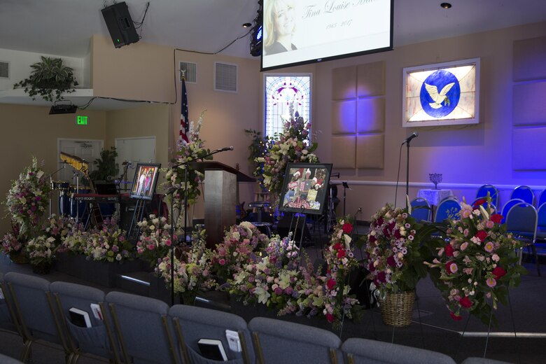 Flowers decorated the Valley Community Chapel alter area before at a celebration of life for Tina Miller, former deputy director of the Combat Center Performance and Innovation Office, in Yucca Valley, Calif., April 29, 2017. (U.S. Marine Corps photo by Cpl. Thomas Mudd)