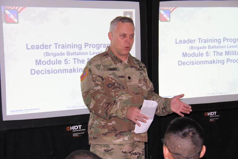 Lt. Col. Tim Lemons, of 1st Brigade, Great Lakes Training Division, 75th Training Command, begins a block of instruction on the Military Decision Making Process, as part of the "warm start" of WAREX 86-17-02 at Ft. McCoy, Wisconsin. Lemons serves as Chief Observer Controller/Trainer of the OC/T team attached to the 457th Transportation Battalion, of Ft. Snelling, Minnesota, during WAREX 86-17-02.