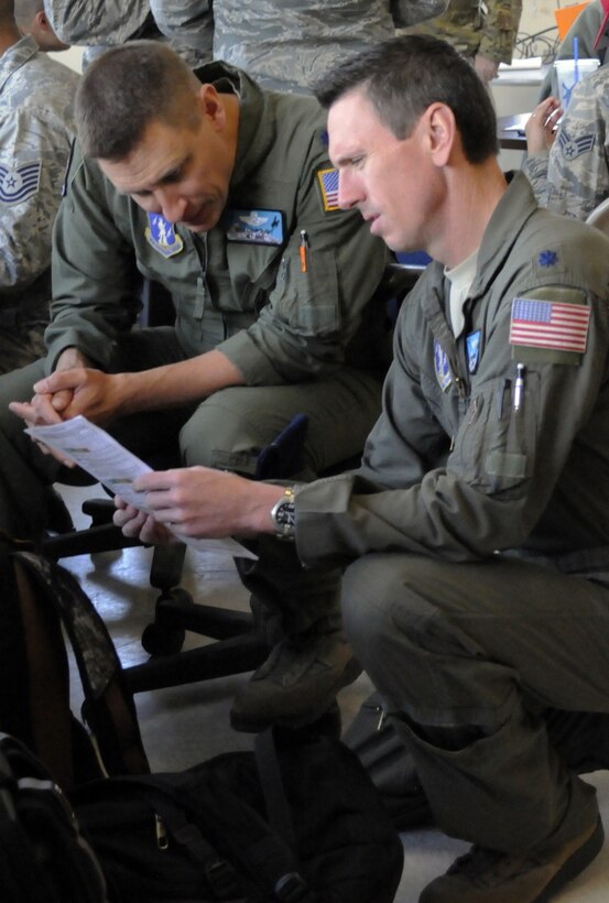 Air Force Lt. Col. Ryan Scofield, a Modular Airborne Fire Fighting System instructor pilot with the Wyoming Air National Guard’s 187th Airlift Wing, prepares to fly a training sortie during annual training at Gowen Field, in Boise, Idaho, April 22, 2017. Air Force photo by Master Sgt. Daniel Butterfield