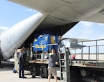 DLA Distribution Corpus Christi, Texas’ Airlift Crew uses a 40,000 Loader to offload Blue Angels support equipment from the team’s C-130.  