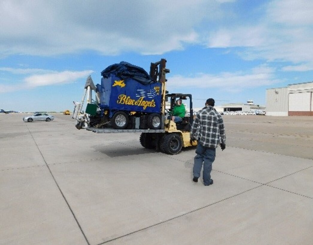 DLA Distribution Corpus Christi employees transport support equipment for the Blue Angels.  