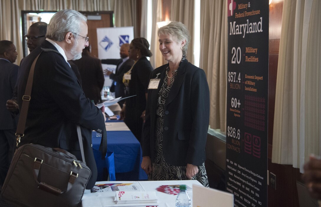 Attendees talk at the Small Business Summit, on Joint Base Andrews, Md., May 4, 2017. Approximately 70 attendees, ranging from construction representatives to business owners, gathered to discuss upcoming contracts and bidding requirements. (U.S. Air Force photo by Senior Airman Mariah Haddenham)