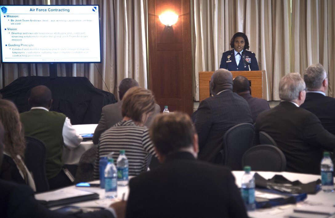 Lt. Col. Wanda McDonald, 11th Contracting Squadron commander, speaks to attendees at the Small Business Summit on Joint Base Andrews, Md., May 4, 2017. Approximately 70 attendees, ranging from construction representatives to business owners, gathered to discuss upcoming contracts and bidding requirements. (U.S. Air Force photo by Senior Airman Mariah Haddenham)