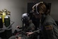 Maj. Kasie Gaona, Air Force Reservist, prepares a student for Aerospace Physiology refresher training using the Reduced Oxygen Breathing Device and Hypoxia Familiarization Trainer May 3. By using the device, Airmen receive their five-year required physiology training in a realistic simulation, locally and without the risks associated with the hypobaric chamber. 