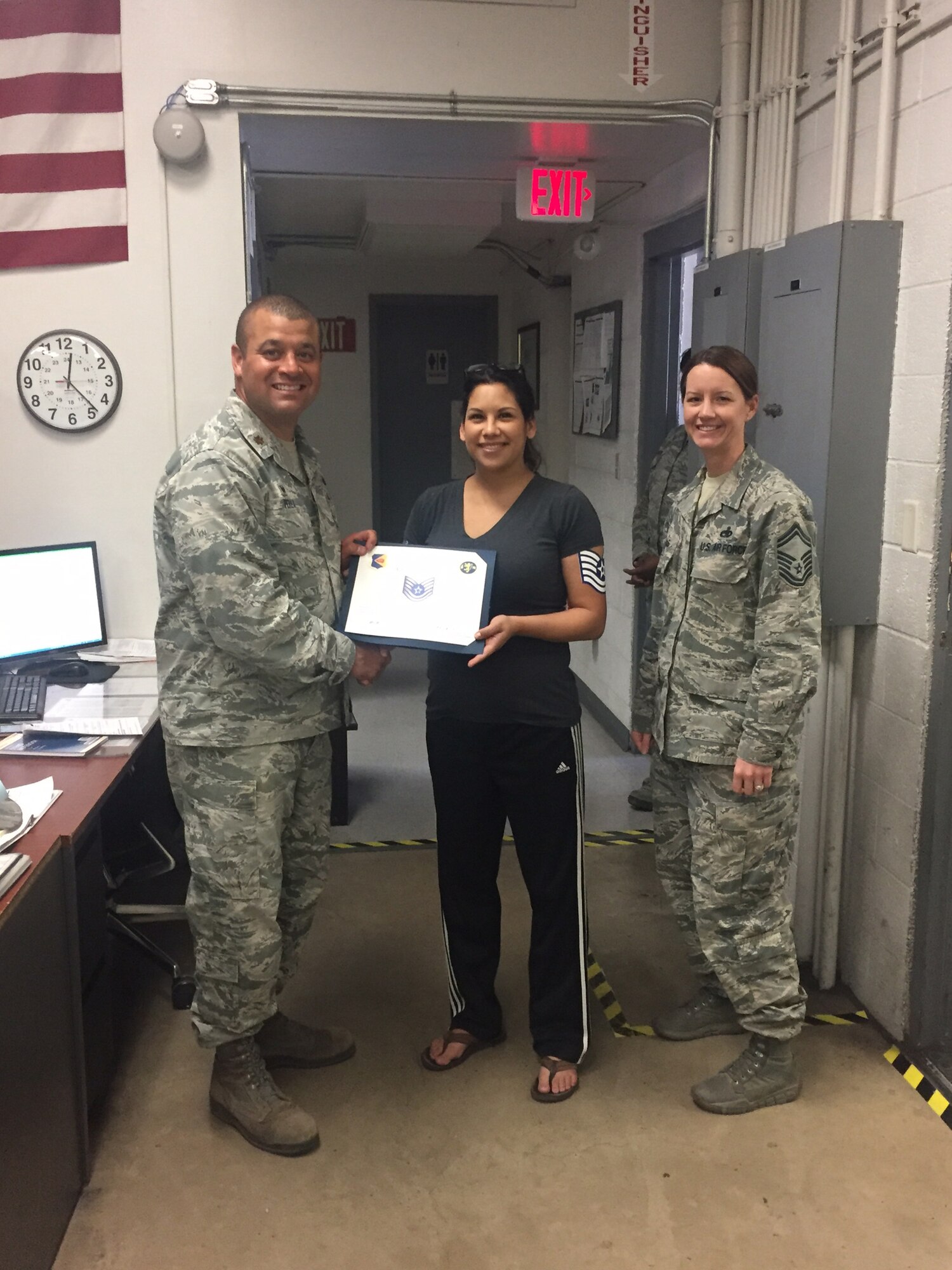 U.S. Air Force Tech. Sgt. Rachel Merriman, 355th Equipment Maintenance Squadron nondestructive inspection craftsman, receives her promotion certificate at Davis-Monthan Air Force Base, Ariz., April 19, 2017. Merriman was hand-selected by her leadership to be promoted through the Stripes for Exceptional Performers program. (courtesy photo)