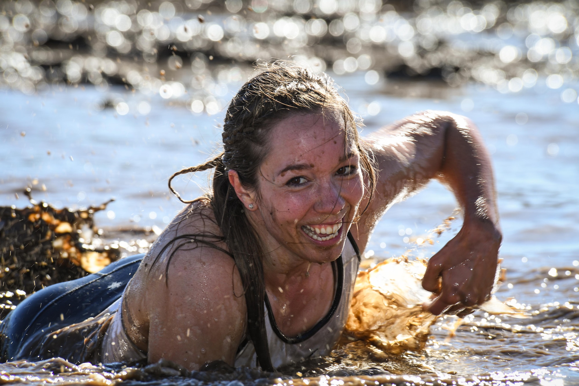 A participant navigates an obstacle May 5 at Hill Air Force Base, Utah, during a mud run hosted by the 775th Explosive Ordnance Disposal Flight. The mud run was part of National Explosive Ordnance Disposal Day, a day to remember EOD technicians who have paid the ultimate sacrifice. There have been 133 EOD technicians killed while performing their craft since 2001, 20 of those being Air Force and four from Hill AFB. (U.S. Air Force/R. Nial Bradshaw)