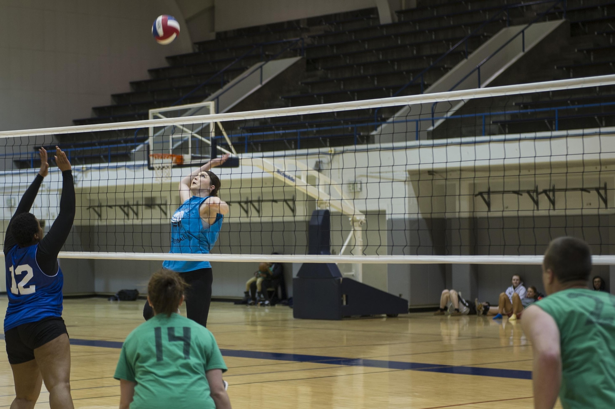U.S. Air Force Airman 1st Class Heather Milisor, a 354th Medical Operations Squadron public health technician, jumps to spike a volleyball April 20, 2017, at Eielson Air Force Base, Alaska. The Air Force offers a variety of different sports that Airmen can try out for, and if they make the team they may get a chance to try out for the U.S. Olympic team. (U.S. Air Force photo by Airman 1st Class Isaac Johnson)    