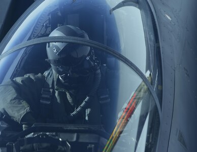 A U.S. Air Force F-15E Strike Eagle weapon systems officer watches as a KC-10 Extender from the 9th Air Refueling Squadron based out of Travis Air Force Base, Calif., conducts in-flight refueling during exercise Northern Edge 2017, May 4, 2017. NE17 is Alaska’s premier joint training exercise designed to practice operations, techniques and procedures as well as enhance interoperability among the services.