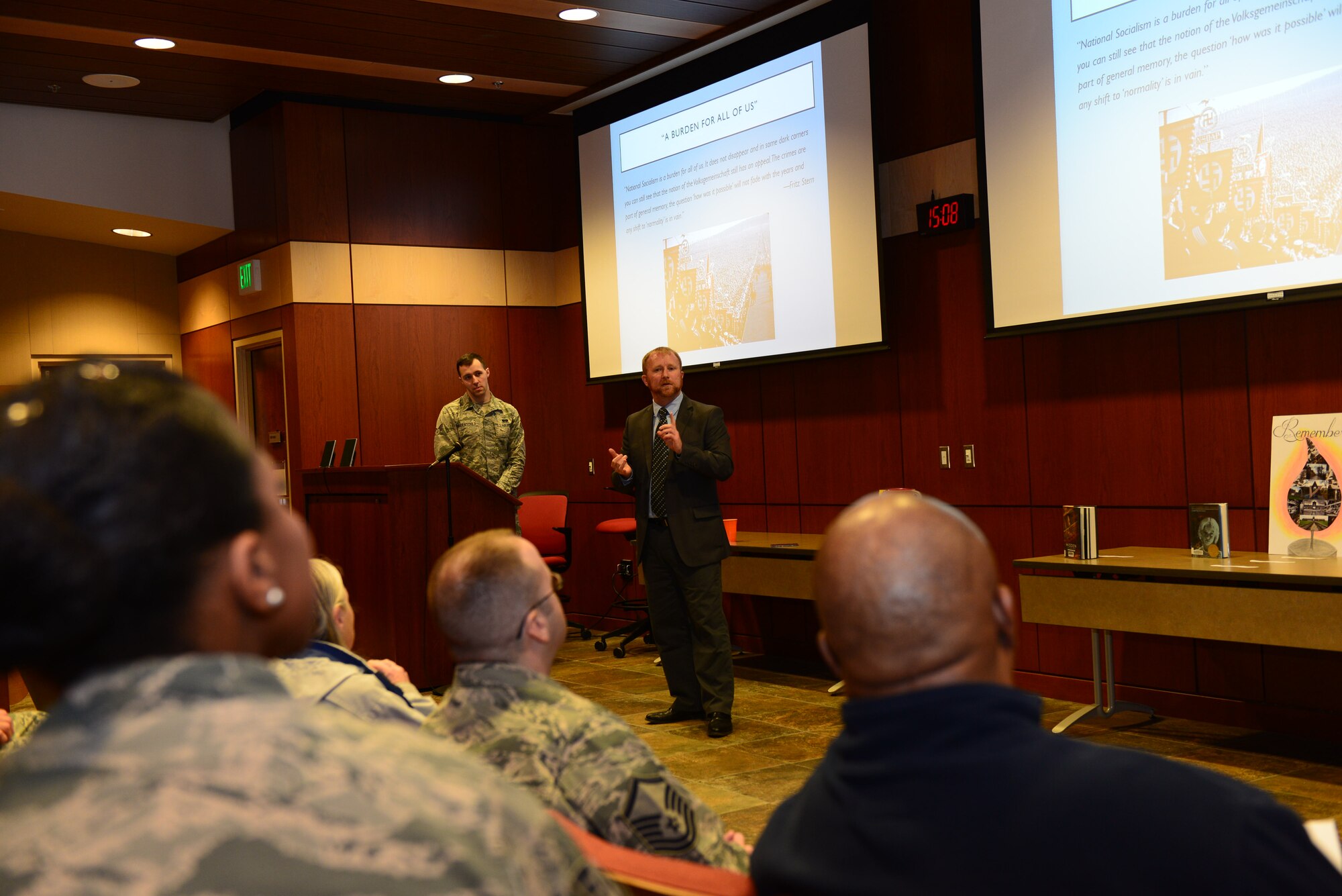 Adam Blackler, an assistant history professor at the Black Hills State University, spoke about the importance of remembering the Holocaust at Ellsworth Air Force Base, S.D., April 27, 2017. Blackler stated learning about the Holocaust and engaging in history can help people understand the dangerous potentials that made this event possible. (U.S. Air Force photo by Airman 1st Class Donald C. Knechtel)