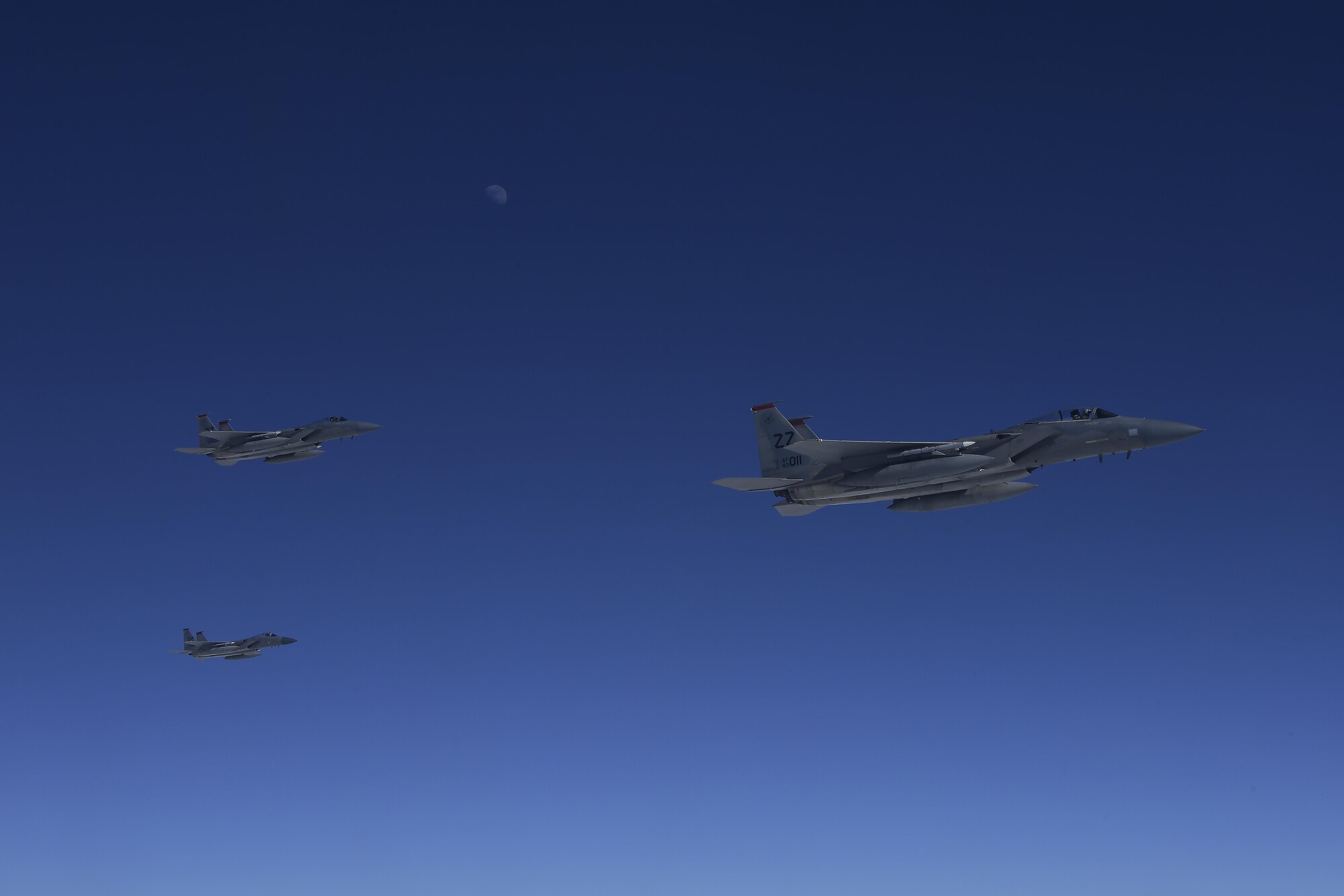 Three U.S. Air Force F-15C Eagles stage on the left side of a KC-10 Extender from the 9th Air Refueling Squadron based out of Travis Air Force Base, Calif., to refuel in-flight during exercise Northern Edge 2017, May 4, 2017. NE17 is Alaska’s premier joint training exercise designed to practice operations, techniques and procedures, as well as enhance interoperability among the services.