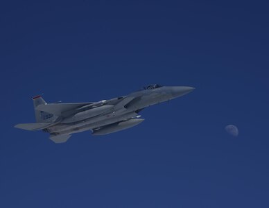 A U.S. Air Force F-15C Eagle stages on the left side of a KC-10 Extender from the 9th Air Refueling Squadron based out of Travis Air Force Base, Calif., to refuel in-flight during exercise Northern Edge 2017, May 4, 2017. NE17 is Alaska’s premier joint training exercise designed to practice operations, techniques and procedures, as well as enhance interoperability among the services.