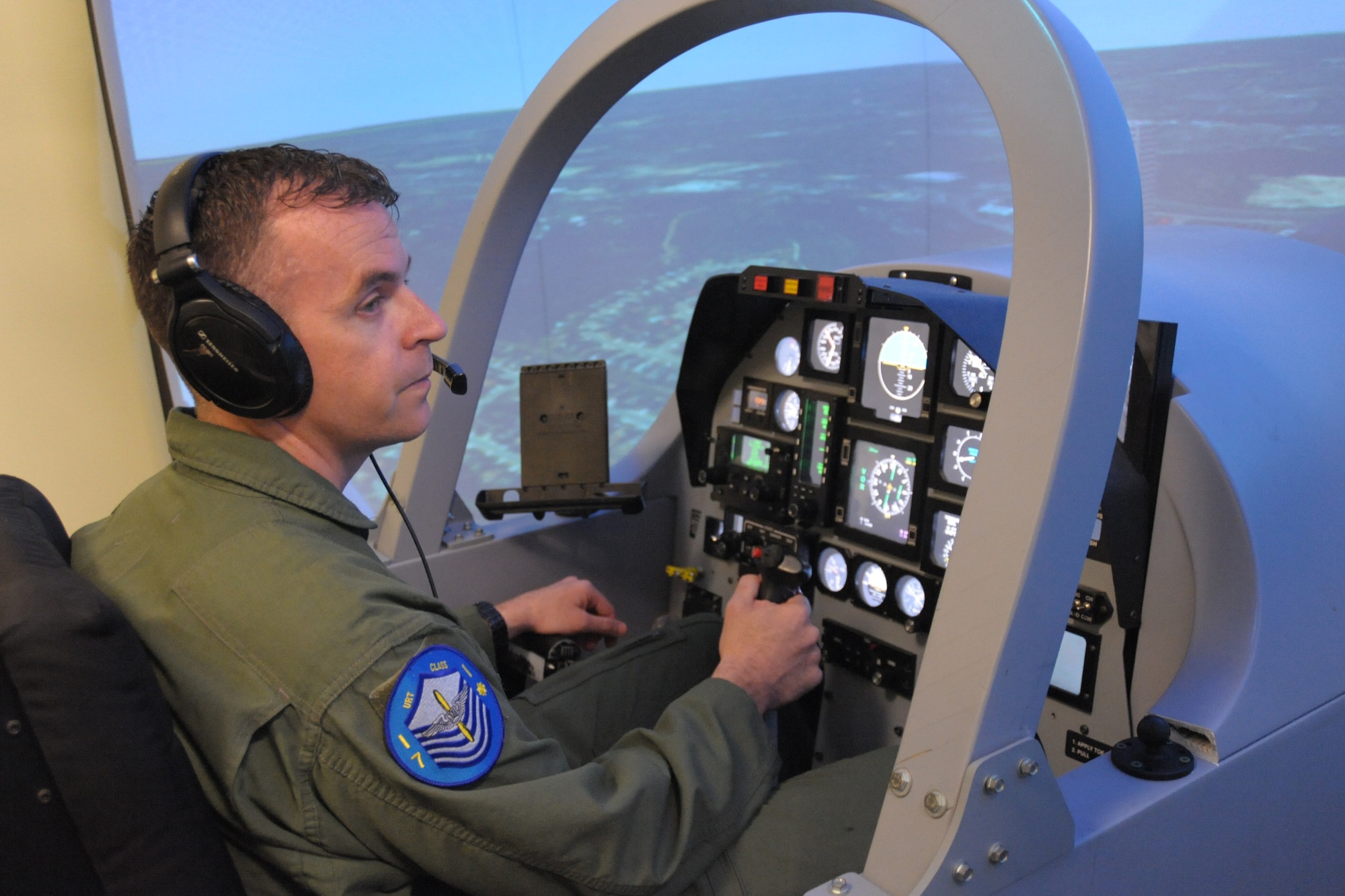 U.S. Air Force Master Sgt. Mike, one of the first Enlisted Pilot Initial Class students, operates flight controls of a T-6 Texan II simulator during the 558th Flying Training Squadron’s Remotely Piloted Aircraft Fundamentals Course at Joint Base San Antonio-Randolph, Texas, May 4, 2017. Mike is one of the first three enlisted Airmen to graduate from the course, making him one of the service's first enlisted pilots since 1961. (U.S. Air Force photo by Joel Martinez) 