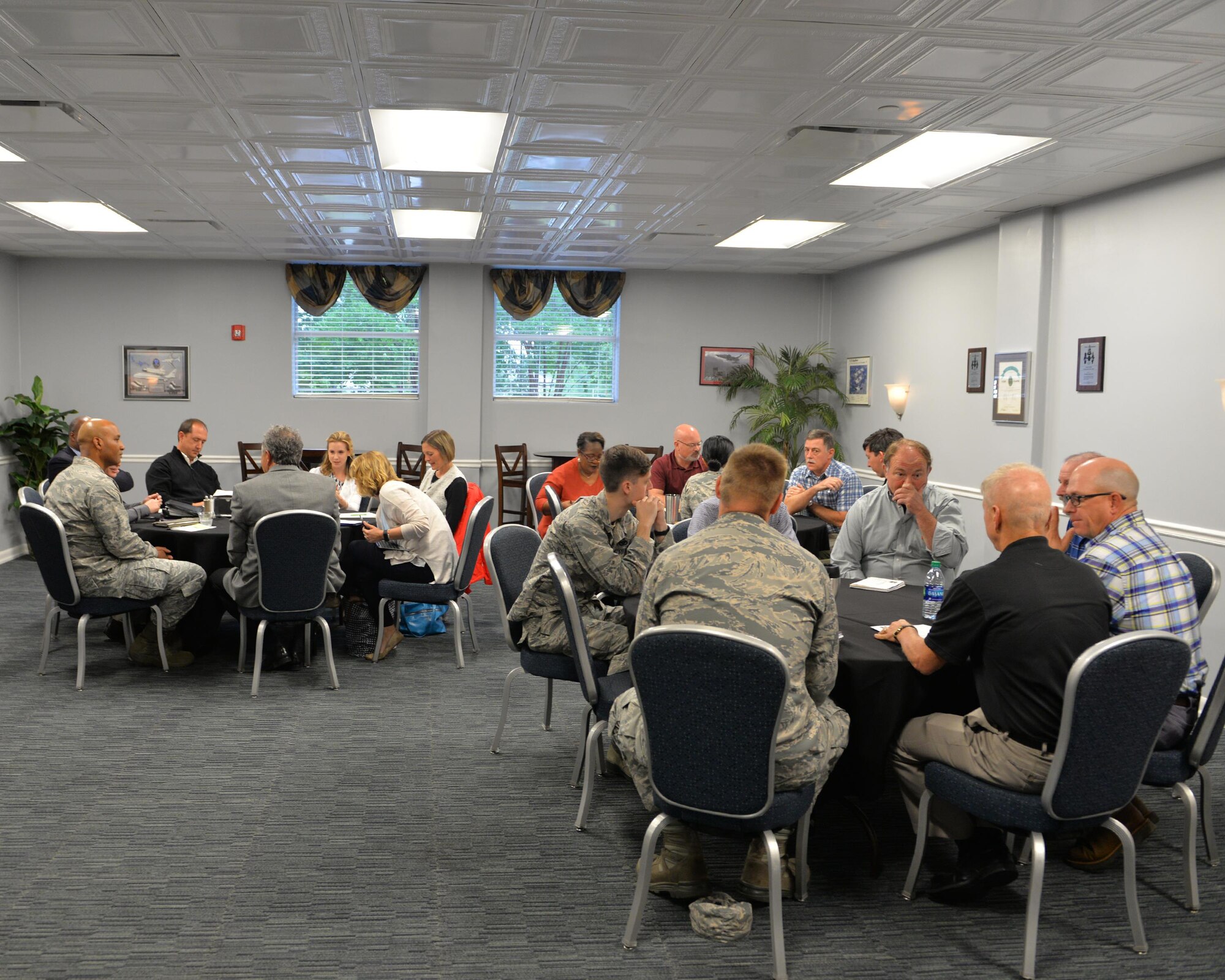 Members of Team Blaze and the local community attend the Community Partnership Progam at the Club May 4, 2017, on Columbus Air Force Base, Mississippi. The participants were split into four different groups to discuss different topics such as Work, Play, Live and Learn. (U.S. Air Force photo by 2nd Lt. Savannah Stephens)