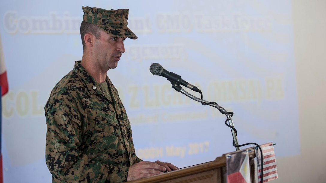 U.S. Marine Lt. Col. Ryan E. Scott delivers his opening remarks during the opening ceremony for the Combined Joint Civil-Military Operations Task Force during Balikatan 2017 in Camp Lapulapu, Cebu, May 1, 2017. Scott is the commanding officer of the CJCMOTF during Balikatan 2017. Balikatan is an annual U.S.-Philippine bilateral military exercise focused on a variety of missions, including humanitarian assistance and disaster relief, counterterrorism and other combined military operations. 