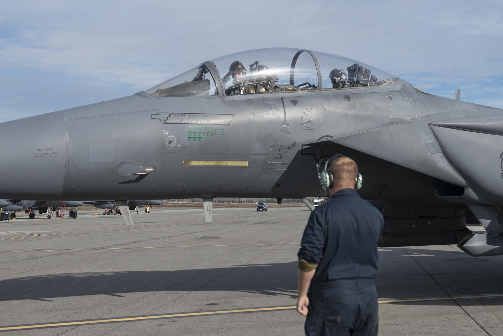 EIELSON AIR FORCE BASE, Alaska – U.S. Air Force Staff Sgt. Brandon Coffman, a 335th Aircraft Maintenance Unit crew chief assigned to Seymour Johnson Air Force Base, N.C., salutes F-15E Strike Eagle dual-role fighter aircraft pilots from the 335th Fighter Squadron, May 4, 2017, during NORTHERN EDGE 2017 (NE17), at Eielson Air Force Base, Alaska. NE17 is Alaska’s premier joint training exercise designed to practice operations, techniques and procedures as well as enhance interoperability among the services. Thousands of participants from all the services, Airmen, Soldiers, Sailors, Marines and Coast Guardsmen from active duty, Reserve and National Guard units are involved. (U.S. Air Force photo/Staff Sgt. Ashley Nicole Taylor)