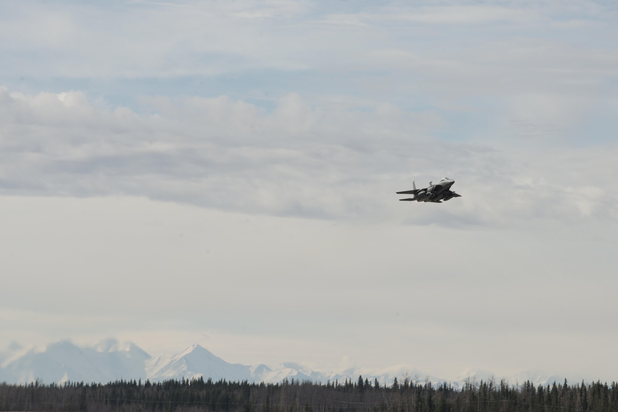 EIELSON AIR FORCE BASE, Alaska – A U.S. Air Force F-15E Strike Eagle dual-role fighter aircraft assigned to the 335th Fighter Squadron, Seymour Johnson Air Force Base, N.C., takes off for a sortie from Eielson Air Force Base, Alaska, May 4, 2017 during NORTHERN EDGE 2017 (NE17). NE17 is Alaska’s premier joint training exercise designed to practice operations, techniques and procedures as well as enhance interoperability among the services. Thousands of participants from all the services, Airmen, Soldiers, Sailors, Marines and Coast Guardsmen from active duty, Reserve and National Guard units are involved. (U.S. Air Force photo/Staff Sgt. Ashley Nicole Taylor)