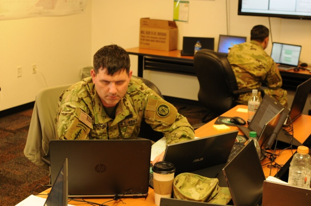 Sgt. James Mitchell, a cyber forensics expert with the Maryland Army National Guard’s 110th Information Operations Battalion, performs a network analysis during Exercise Cyber Shield 17 at Camp Williams, Utah, May 1, 2017. (U.S. Air National Guard photo by Lt. Col. Wayde Minami